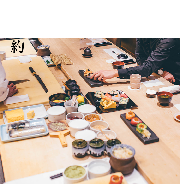 お客様が寿司を召し上がる画僧